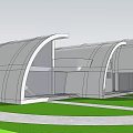 Modern Office Building Exterior With Curved Roof Glass Elements Lawn And Walkway