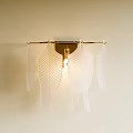Elegant Wall Mounted Sconce With White Leaf Shaped Glass Shades And Warm Lighting