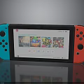 Portable Electronic Gaming Console With Red Blue Controllers And Game Interface