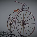 Vintage Bicycle With Large Front Wheel Small Rear Wheel And Leather Seat