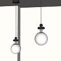 Modern Pendant Lights With White Spherical Shades And Black Tops
