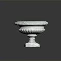 Detailed Stone Flower Pot With Ornate Carved Edges And Square Base