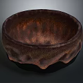 Hand Carved Sculptural Bowl with Textured Surface and Natural Brown Tones