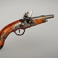 Antique Pistol with Wooden Grip and Intricate Metal Components in Vintage Design