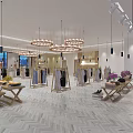 Elegant Clothing Store With Circular Chandeliers Herringbone Floor Large Windows And Clothes On Racks