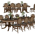 Wooden Dining Table Set With Cane Back Chairs And Green Plant Centerpieces
