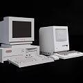 Two Vintage Retro Desktop Computers With CRT Monitors Keyboards And Mice