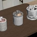 Fabric Storage Baskets with Decorative Details for Organizing Toilet Paper and Cloth on Wooden Tabletop