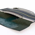 Two Lane Road Bridge With Guardrail Spanning Over Water And Green Bank