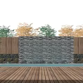 Outdoor Water Wall With Wooden Deck Pool Stone Accents And Trees With Green Orange Foliage