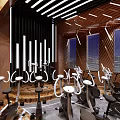 Stylish Fitness Studio Featuring Neatly Arranged Spin Bikes Wooden Walls And Modern Lighting