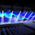 Fashion Stage With Blue Background Screens FENGWENA Branding Spotlights And Audience Seats