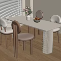 Modern White Dining Table with Four Beige Chairs and Pink Flower Vase on Wooden Floor