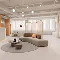 Modern Minimalist Clothing Store Interior With Curved Sofa Golden Partitions Clothing Racks And Pendant Lights
