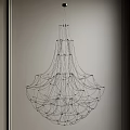 Modern Chandelier With Intricate Wire Structure And Layered Design For Stylish Interior Decor