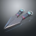Two Black And Silver Textured Daggers With Sharp Blades And Blue Red Accent Handles