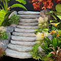 Stone Steps Surrounded By Lush Green Plants And Red Leaf Foliage 3d model