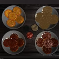 Traditional Assorted Mooncakes On White Plates With Different Fillings And Toppings