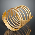 Golden Spiral Sculpture with Multiple Curved Metal Rings Shiny Surface and Unique Wavy Edges Design