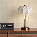 Fabric Lampshade Table Lamp with Brass Base on Wooden Cabinet Beige Wall Digital Clock
