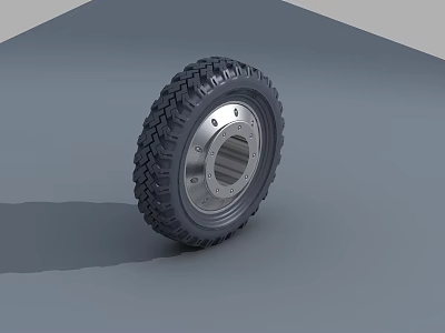 Durable Heavy Duty Tire With Deep Tread And Silver Metal Rim On Gray Surface 3d model