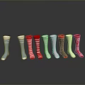 Colorful Patterned Socks Collection with Stripes Polka Dots Snowflake Designs Neatly Arranged on Grey Background