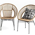 Rattan Outdoor Chairs With Black Metal Legs And Geometric Pattern Cushion