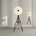 Modern Minimalist Floor Lamp with Circular Shade Tripod Stand and Moon Decor in Interior