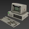 Vintage Computer Setup Featuring Green Screen CRT Monitor Keyboard And Gray Main Unit