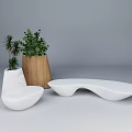 Elegant Tea Set With Marble And Wooden Accents Decorated By Small Green Plants