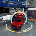 Red Mazda 240 TURBO Showcased in Modern Showroom with Innovative Safety Technology