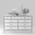 White Entryway Console Side Cabinet With Gold Handles Drawers And Decorative Globe Candles Plant Books