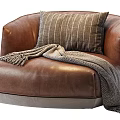Modern Brown Leather Single Sofa With Gray Base Striped Pillow And Cozy Throw Blanket