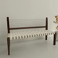 Modern Minimalist Leisure Chair with Dark Wood Frame White Woven Seat and Dried Flower Vase
