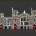 Gothic Style Stone Building With Tower Spires Blue Roof Stained Glass Windows And Red Doors