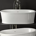 Sleek White Modern Bathtub with Oval Shape and Chrome Faucet Fixtures