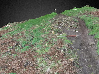 Green Hillside Scenery with Dirt Path Stones and Red Object Under Dark Sky 3d model