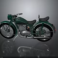 Green Vintage Motorcycle With Black Seat And Shiny Metal Retro Design