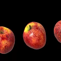 Fresh Red Apples With Yellow Speckles Arranged In A Row On Black Background