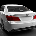 White Sleek Sedan With Sporty Wheels Unique Grille And Modern Exterior Design