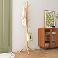 Wooden Coat Rack Hanging Coat Canvas Bag With Wooden Cabinet Green Door And Wooden Floor