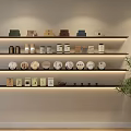 Tea Sets Display on Modern Wall Shelves with Various Teacups Teapots Trays and Potted Plant