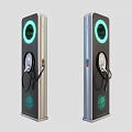 Three Electric Vehicle Charging Stations With Black Silver Design Green Circular Lights And Charging Ports