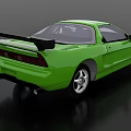 Three Colorful Sports Car Models With Rear Spoilers In Green White Orange