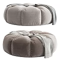 Soft Round Gray Velvet Ottoman With Pleated Design And Draped Blanket