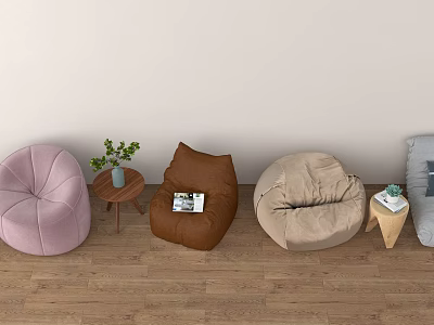 Colorful Bean Bag Chairs with Small Tables Green Plants and Magazines in Living Room 3d model