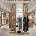 Modern Clothing Store With Mannequins Displaying Suits Casual Wear And Well Arranged Racks
