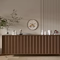 Brown Vertical Striped Dresser With Decorative Items Potted Plant And Wall Clock In Interior Scene