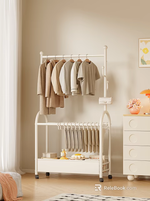 White Clothes Rack With Hanging Coats T Shirts And Pants Near Drawer Cabinet Lamp Vase 3d model 