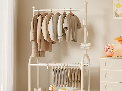 White Clothes Rack With Hanging Coats T Shirts And Pants Near Drawer Cabinet Lamp Vase 3d model